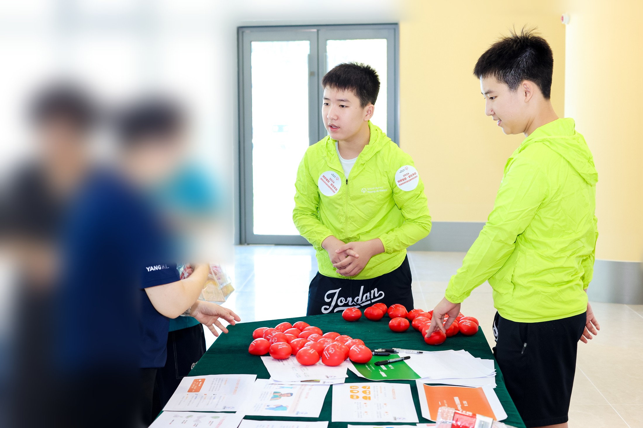 Eason and Evan Volunteer at Fengtai Special Olympics Day
